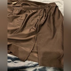 Catherine’s NWOT black swim skirt w/shorts and left side split size 5X